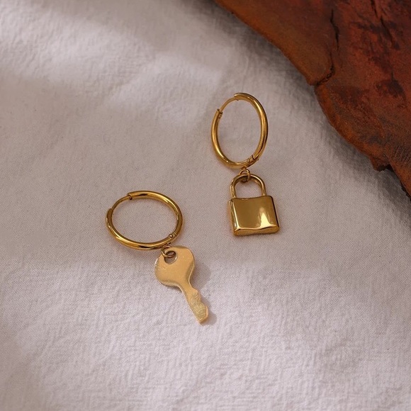 Anthropologie Jewelry - “Lock it” earrings
